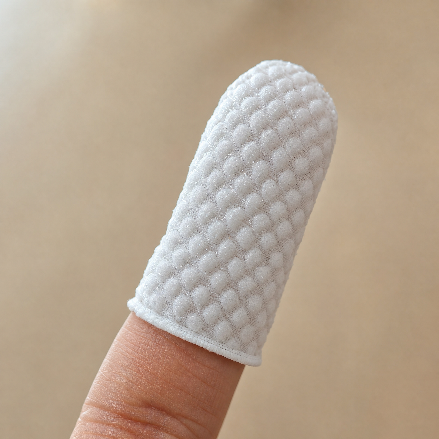 Close-up of the textured surface of the finger wipe