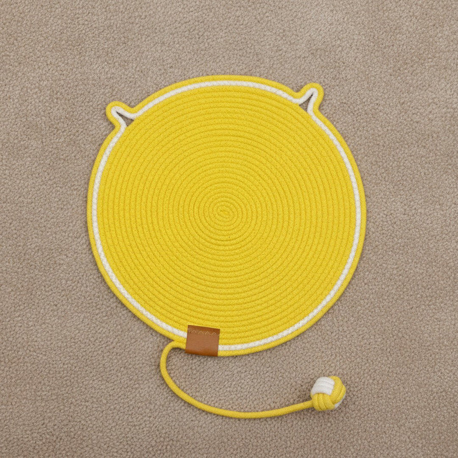 Yellow scratch mat with rope ball